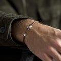 Bracelet en cuir tressé et fermoir ovale - 1