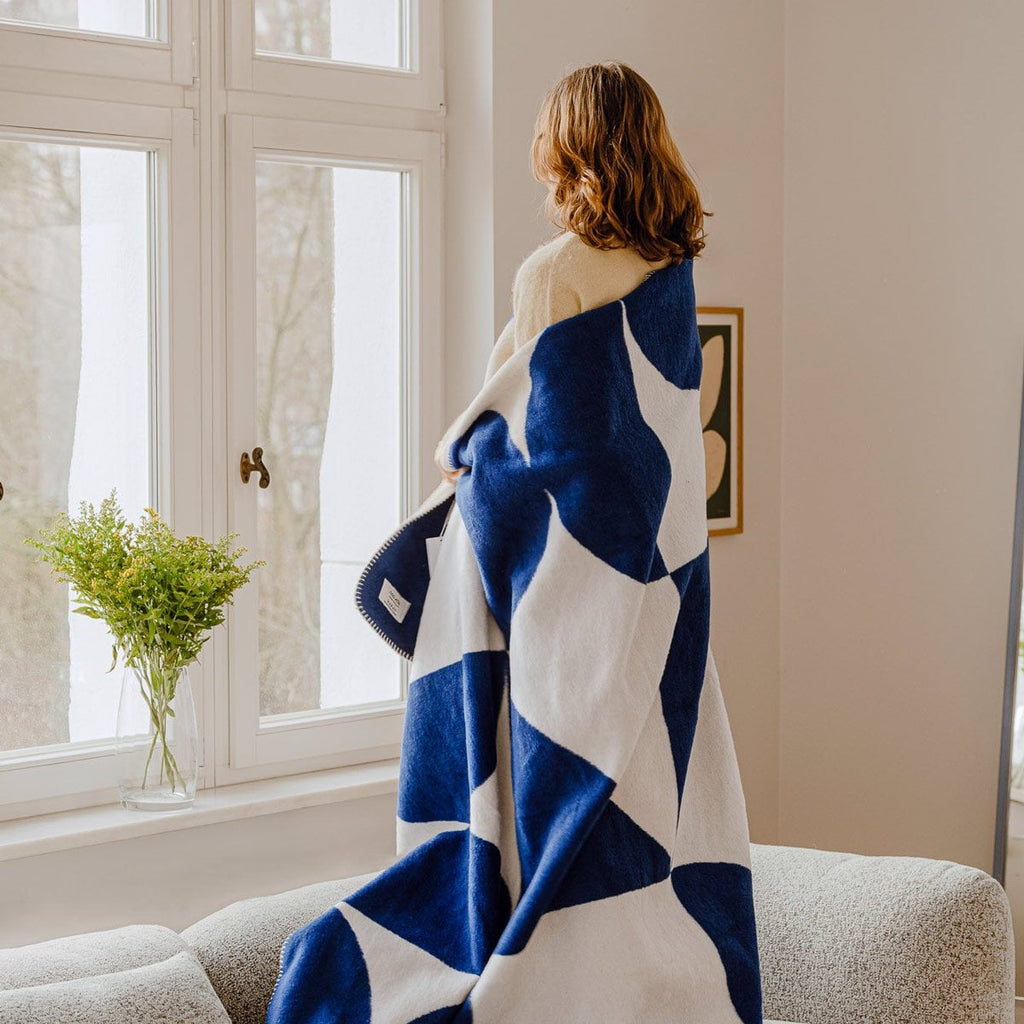 Plaid bleu à motifs géométriques - 1