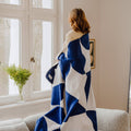 Plaid bleu à motifs géométriques - 1