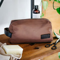 Trousse de toilette en toile et cuir - 1